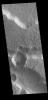 This image from NASA's Mars Odyssey shows the margin between Terra Cimmeria and Elysium Planitia. This boundary region is typified by tectonic fractures forming long, linear depressions.