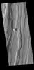 This image from NASA's Mars Odyssey shows part of both Tractus Fossae and Tractus Catena, some of many north/south trending tectonic graben located south of Alba Mons.