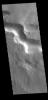 This image from NASA's Mars Odyssey shows a channel located on the western margin of Medusae Fossae.