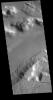 This image from NASA's Mars Odyssey shows the region where the northward flow of Kasei Valles turns to the east having split into two large channels.