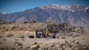 A field team sets up equipment in the Nevada desert in February 2020 as part of a training session for scientists who will work with NASA's Perseverance Mars rover after it lands.