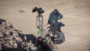 Two members of a field team set up cameras in the Nevada desert in February 2020, as part of a simulated rover operation designed to train scientists who will work with NASA's Perseverance rover.
