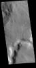 This image from NASA's Mars Odyssey shows a channel called Auqakuh Vallis and is located in northern Terra Sabaea.