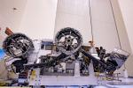 Three of the six flight wheels that will travel to Mars can be seen attached to NASA's Perseverance rover on March 30, 2020 at the Kennedy Space Center in Florida.