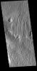 This image from NASA's Mars Odyssey shows evidence of long term wind action and erosion east of Eumenides Dorsum.