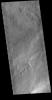 This image from NASA's Mars Odyssey shows part of the extensive volcanic flows in the Tharsis region.