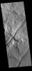 This image from NASA's Mars Odyssey shows channel-like features known as tectonic graben. These graben are called Icaria Fossae and are located in Terra Sirenum.