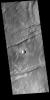 This image from NASA's Mars Odyssey shows depressions, called graben, which form by the down drop of material between two parallel faults.