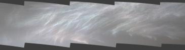 NASA's Curiosity Mars rover spotted these iridescent, or mother of pearl, clouds on March 5, 2021. Seen here are five frames stitched together from a much wider panorama taken by the rover's Mast Camera, or Mastcam.