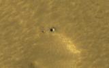 This image acquired on April 23, 2021 by NASA's Mars Reconnaissance Orbiter, shows a small crater, first seen by HiRISE.