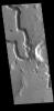 This image from NASA's Mars Odyssey shows ppart of Hephaestus Fossae, located in Utopia Planitia.