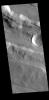 This image from NASA's Mars Odyssey shows part of Acheron Fossae. Acheron Fossae is the highly fractured, faulted and deformed terrain located 1,050 kilometers (650 miles) north of the large shield volcano Olympus Mons.