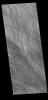 This image from NASA's Mars Odyssey shows the upper slopes of Olympus Mons. Numerous thin lava flows are visible.