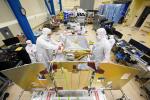 Engineers work on the JPL-developed High-resolution Volatiles and Minerals Moon Mapper (HVM³) for NASA's Lunar Trailblazer spacecraft in a clean room at Lockheed Martin Space in Littleton, Colorado, in December 2022.