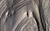 This image acquired on February 8, 2022 by NASA's Mars Reconnaissance Orbiter shows central Valles Marineris, filled with sediments rich in hydrated sulfates.