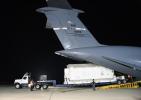 A container with the Surface Water and Ocean Topography (SWOT) satellite is offloaded from an Air Force C-5 airplane on Oct. 16, 2022, at Vandenberg Space Force Base in Central California.