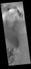 This image from NASA's Mars Odyssey shows part of an unnamed crater in Aonia Terra.