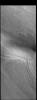This image from NASA's Mars Odyssey shows part of the south polar cap. The cap is comprised of layers of ice and dust deposited over millions of years. This image was collected near the end of summer.