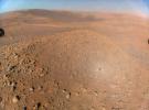This image of NASA's Perseverance Mars rover at the rim of Belva Crater was taken by the agency's Ingenuity Mars Helicopter during the rotorcraft's 51st flight on April 22, 2023.