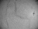 NASA's Ingenuity Mars Helicopter is seen in shadow in an image captured by its navigation camera during the rotorcraft's 52nd flight on April 26, 2023. This image was finally received after Perseverance and Ingenuity were out of communication for 63 days.