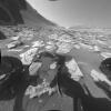 NASA's Curiosity rover used its front and rear black-and-white Hazcams to capture 12 hours of a Martian day. The rover's shadow is visible on the surface in these images taken by the front Hazcam.