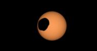 NASA's Perseverance Mars rover used its Mastcam-Z camera to capture the silhouette of Phobos, one of the two Martian moons, as it passed in front of the Sun on Feb. 8, 2024.