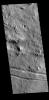 This image from NASA's Mars Odyssey shows linear features which are tectonic graben.