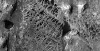 Scientists think that ancient groundwater formed this weblike pattern of ridges, called boxwork, that were captured by NASA's Mars Reconnaissance Orbiter on Dec. 10, 2006.