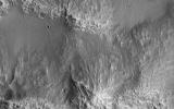 This image acquired on March 9, 2024 by NASA's Mars Reconnaissance Orbiter shows terrain of two distinct ages. The slopes and hilltops here are made up of rough rocky outcrop, while the valley floors are filled with smooth materials with fewer craters.