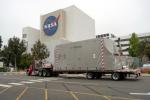 A truck arrives at NASA's Jet Propulsion Laboratory on June 3, 2024, to deliver the Medium Articulating Transportation System (MATS), which will be used during the construction and transportation of components for NASA's NEO Surveyor mission.