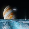 This artist's concept depicts NASA's Europa Clipper spacecraft as it orbits Jupiter and passes over the gas giant's ice-covered moon Europa.