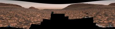 Curiosity captured this panorama using its Mastcam while heading west away from Gediz Vallis channel on Nov. 2, 2024. The Mars rover's tracks across the rocky terrain are visible at right.